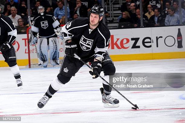 Kyle Clifford of the Los Angeles Kings skates with the puck against the Columbus Blue Jackets at Staples Center on April 18, 2013 in Los Angeles,...