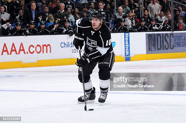 Mike Richards of the Los Angeles Kings skates with the puck against the Columbus Blue Jackets at Staples Center on April 18, 2013 in Los Angeles,...