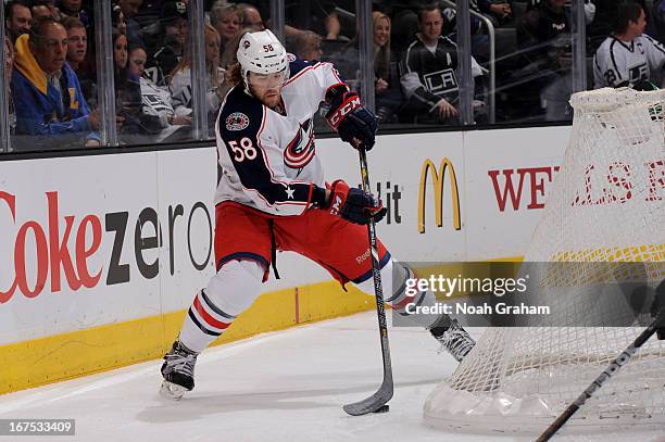 David Savard of the Columbus Blue Jackets skates with the puck against the Los Angeles Kings at Staples Center on April 18, 2013 in Los Angeles,...