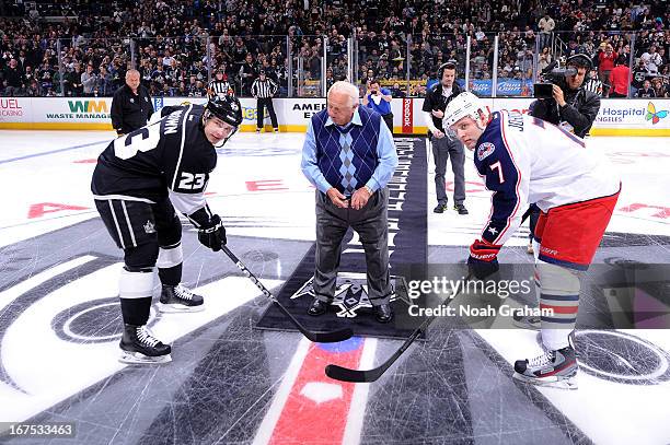 Tommy Lasorda drops the ceremonial puck with Dustin Brown of the Los Angeles Kings and Jack Johnson of the Columbus Blue Jackets at Staples Center on...