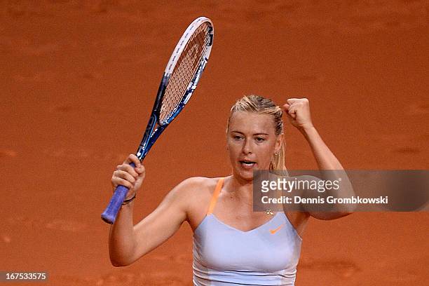Maria Sharapova of Russia celebrates after defeating Ana Ivanovic of Serbia during Day 5 of the Porsche Tennis Grand Prix at Porsche-Arena on April...