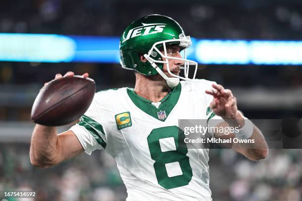 Aaron Rodgers of the New York Jets passes as he warms up prior to a game against the Buffalo Bills at MetLife Stadium on September 11, 2023 in East...