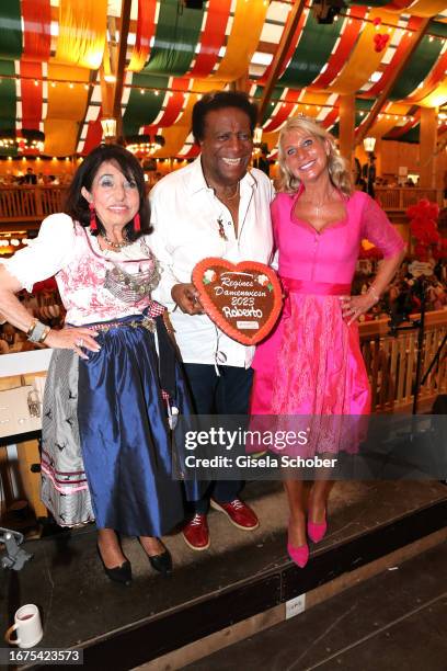 Regine Sixt, Roberto Blanco and Karin Baumueller-Soeder during the Regine's Damenwiesn at Schützen-Festzelt Theresienwiese on September 18, 2023 in...