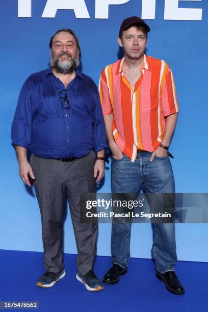 Patrick d'Assumcao and Antoine Reinartz attend the "Tapie" Netflix Premiere at UGC Normandie on September 11, 2023 in Paris, France.