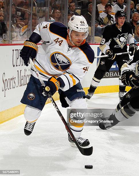 Andrej Sekera of the Buffalo Sabres skates moves the puck against the Pittsburgh Penguins on April 23, 2013 at Consol Energy Center in Pittsburgh,...