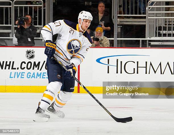 Adam Pardy of the Buffalo Sabres moves the puck against the Pittsburgh Penguins on April 23, 2013 at Consol Energy Center in Pittsburgh, Pennsylvania.