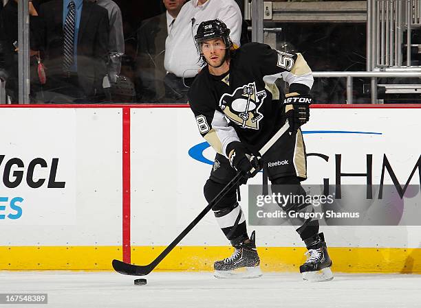 Kris Letang of the Pittsburgh Penguins controls the puck against the Buffalo Sabres on April 23, 2013 at Consol Energy Center in Pittsburgh,...