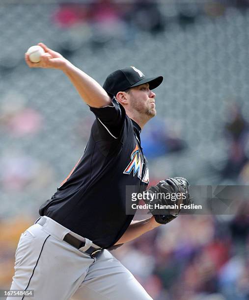 Ryan Webb of the Miami Marlins delivers a pitch against the Minnesota Twins during the first game of a doubleheader on April 23, 2013 at Target Field...