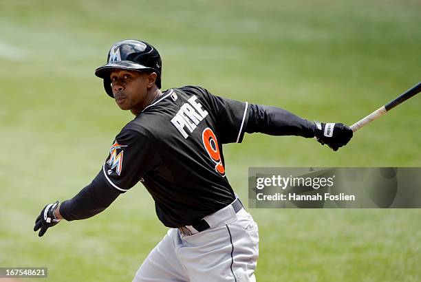 Juan Pierre of the Miami Marlins bats against the Minnesota Twins during the first game of a doubleheader on April 23, 2013 at Target Field in...