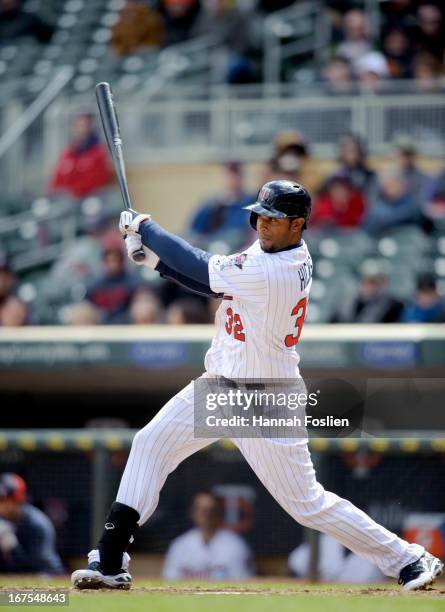 Aaron Hicks of the Minnesota Twins bats against the Miami Marlins during the first game of a doubleheader on April 23, 2013 at Target Field in...