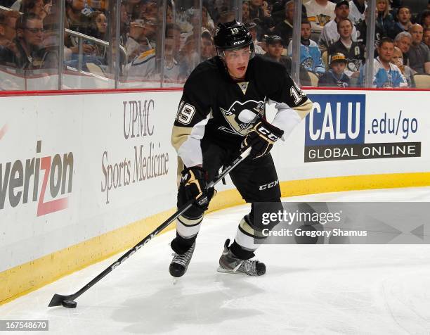 Beau Bennett of the Pittsburgh Penguins controls the puck against the Buffalo Sabres on April 23, 2013 at Consol Energy Center in Pittsburgh,...