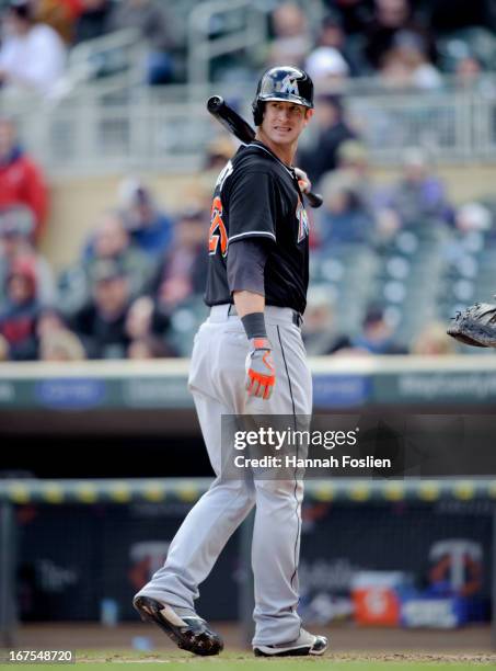 Joe Mahoney of the Miami Marlins looks on during an at bat against the Minnesota Twins during the first game of a doubleheader on April 23, 2013 at...