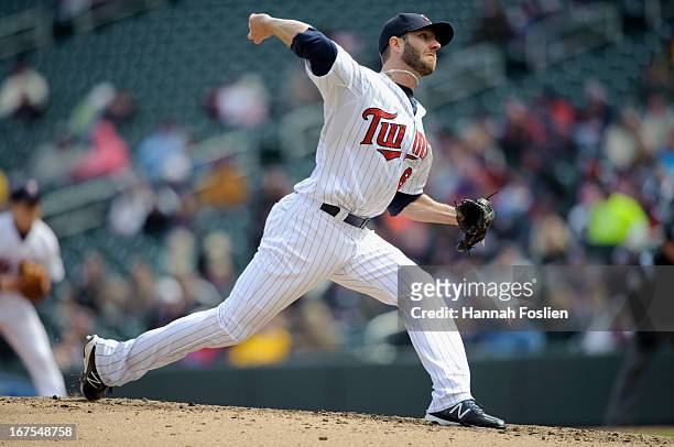 Jared Burton of the Minnesota Twins delivers a pitch against the Miami Marlins during the first game of a doubleheader on April 23, 2013 at Target...