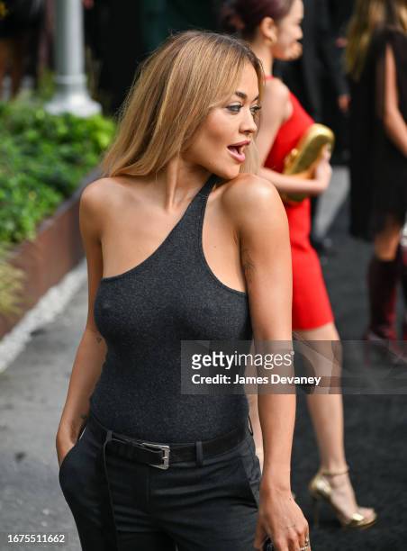 Rita Ora arrives to Michael Kors fashion show at Domino Park on September 11, 2023 in New York City.