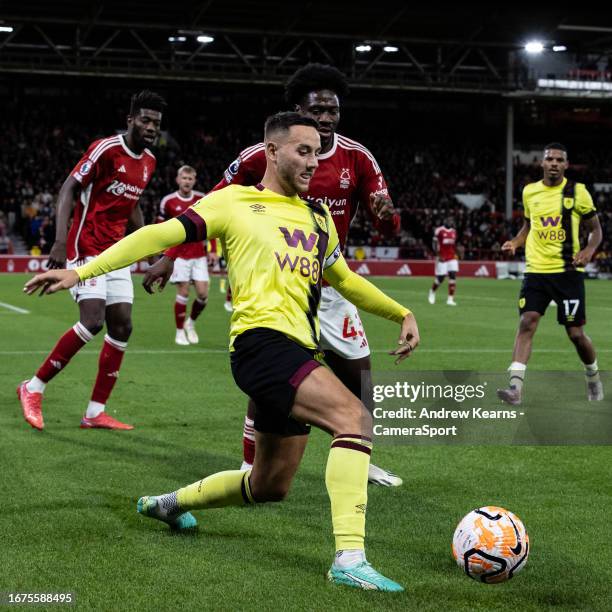 Burnley's Josh Brownhill breaks away from Nottingham Forest's Ola Aina during the Premier League match between Nottingham Forest and Burnley FC at...