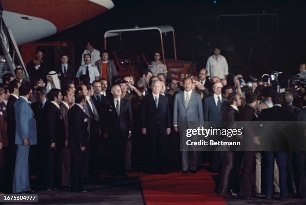 Egyptian President Anwar Sadat pictured with Prime Minister Menachem Begin on arrival at Ben Gurion Airport in Israel, November 19th 1977.