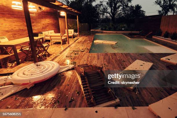 demolished patio after heavy storm and severe winds. - damaged furniture stock pictures, royalty-free photos & images