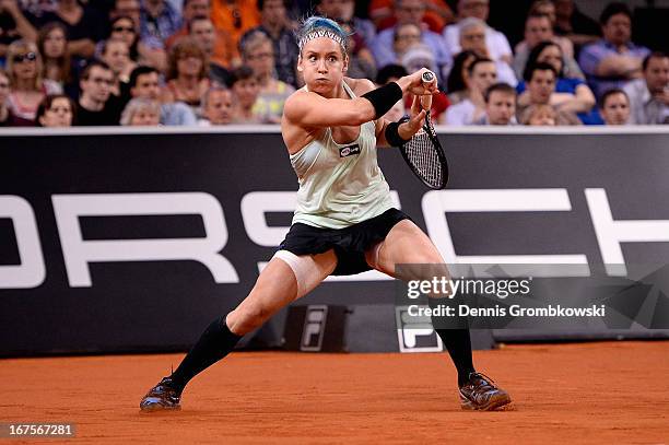 Bethanie Mattek-Sands of the United States plays a forehand in her match against Sabine Lisicki of Germany during Day 5 of the Porsche Tennis Grand...