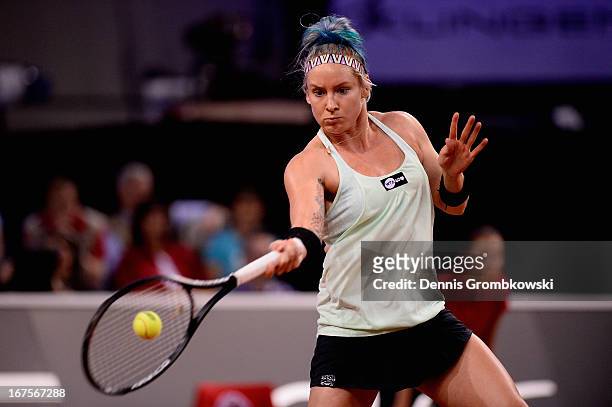 Bethanie Mattek-Sands of the United States plays a forehand in her match against Sabine Lisicki of Germany during Day 5 of the Porsche Tennis Grand...