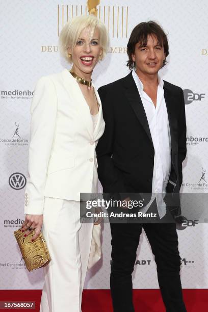 Katja Eichinger and Anthony James arrive for the Lola - German Film Award 2013 at Friedrichstadt-Palast on April 26, 2013 in Berlin, Germany.