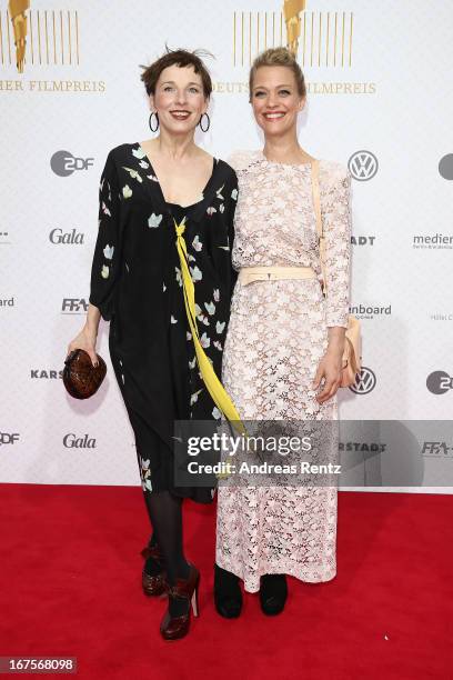 Meret Becker and Heike Makatsch arrive for the Lola - German Film Award 2013 at Friedrichstadt-Palast on April 26, 2013 in Berlin, Germany.