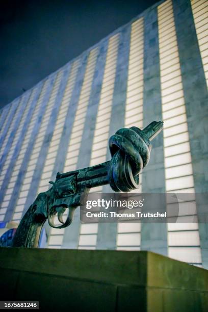 Non violence sculpture of a knotted pistol in front of the United Nations main building on September 18, 2023 in New York City, United States.