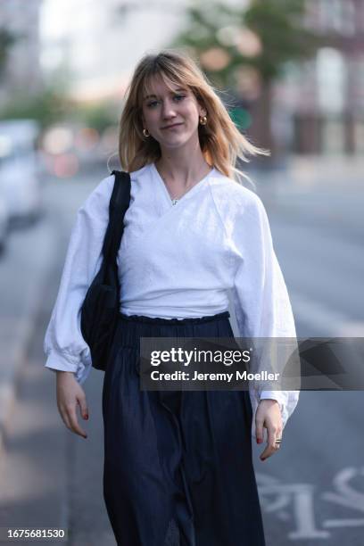 SoSue Rock und blouse, Zara ballerinas, VeeCollective bag on June 08, 2023 in Hamburg, Germany.