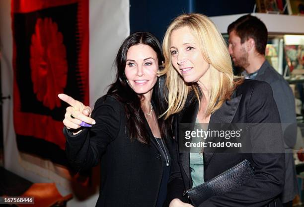 Actresses Courteney Cox and Lisa Kudrow attend P.S. ARTS Presents: LA Modernism Show Opening Night at The Barker Hanger on April 25, 2013 in Santa...
