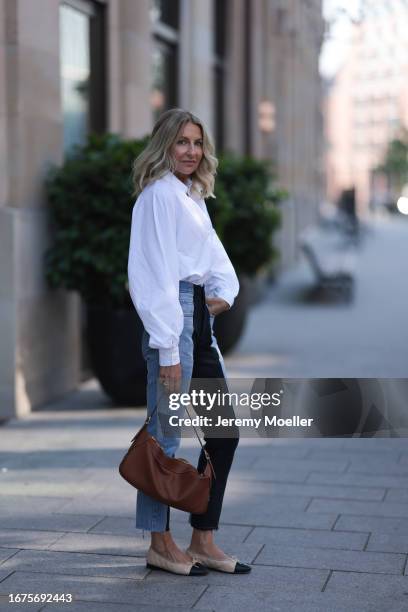 Celine bag, ELV denim, Chanel ballerinas, SoSue blouse and jacket on June 08, 2023 in Hamburg, Germany.