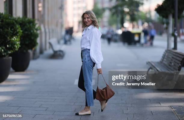 Celine bag, ELV denim, Chanel ballerinas, SoSue blouse and jacket on June 08, 2023 in Hamburg, Germany.