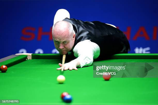 John Higgins of Scotland plays a shot in the second round match against Kyren Wilson of England on day 2 of World Snooker Shanghai Masters 2023 at...