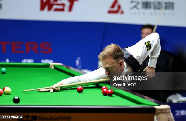 Judd Trump of England plays a shot in the second round match against Jack Lisowski of England on day 2 of World Snooker Shanghai Masters 2023 at...