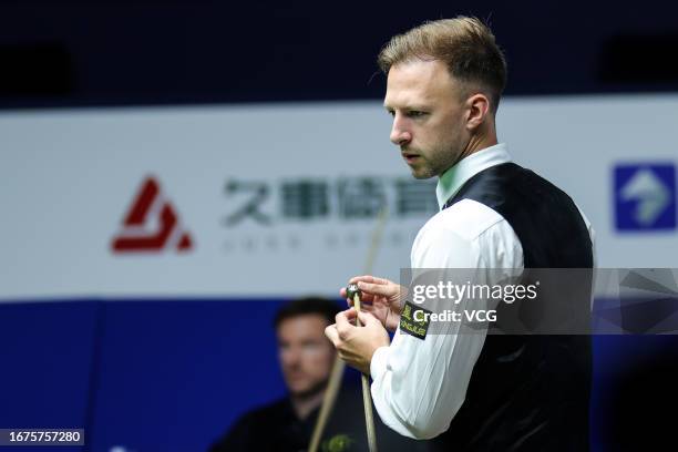 Judd Trump of England reacts in the second round match against Jack Lisowski of England on day 2 of World Snooker Shanghai Masters 2023 at Shanghai...