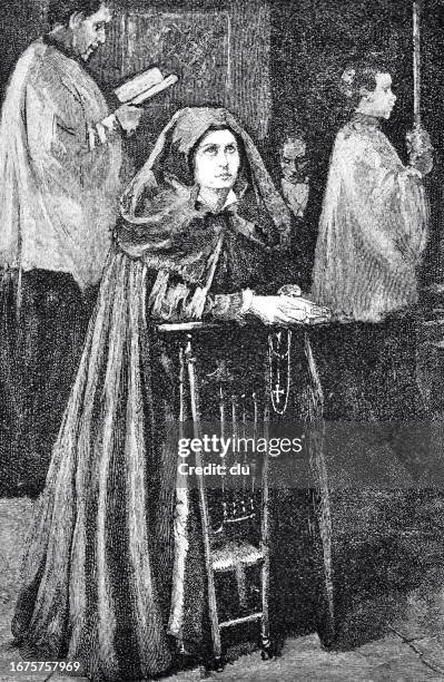 woman praying in the church of saint-jean-de-luz - luz stock illustrations