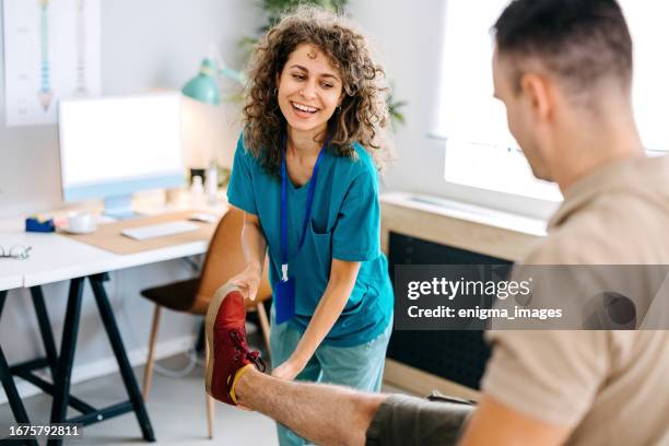 i'm here for pain - physical therapist stock pictures, royalty-free photos & images