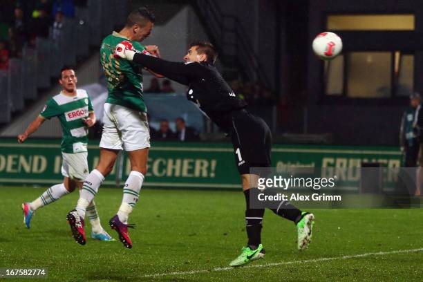 Nikola Djurdjic of Greuther Fuerth scores his team's second goal against goalkeeper Ron-Robert Zieler of Hannover during the Bundesliga match between...