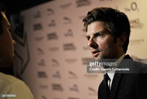 Actor Adam Scott attends the "A.C.O.D" screening during the Sundance London Film And Music Festival 2013 at Sky Superscreen O2 on April 26, 2013 in...