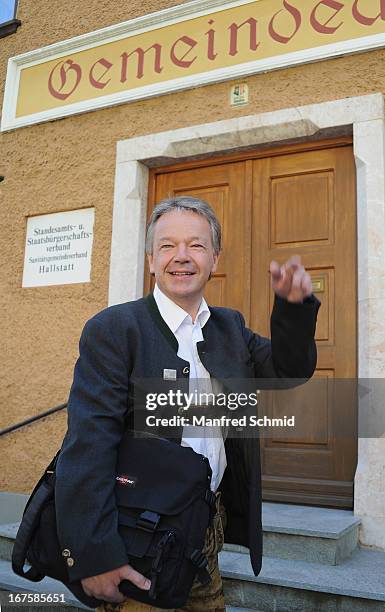 Alexander Scheutz poses after a press conference for the oldest known wooden staircase which leads to a salt mine, on April 26, 2013 in Hallstatt,...