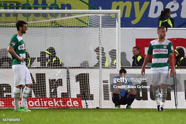 Mergim Mavraj, goalkeeper Wolfgang Hesl and Bernd Nehrig of Greuther Fuerth react after the Bundesliga match between SpVgg Greuther Fuerth and...