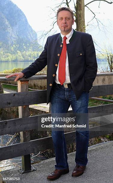 Kurt Thomanek poses after a press conference for the oldest known wooden staircase which leads to a salt mine on on April 26, 2013 in Hallstatt,...
