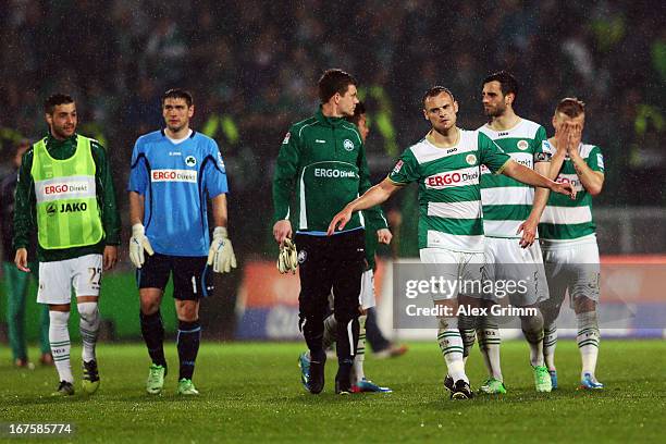 Bernd Nehrig of Greuther Fuerth and team mates react after the Bundesliga match between SpVgg Greuther Fuerth and Hannover 96 at Trolli-Arena on...