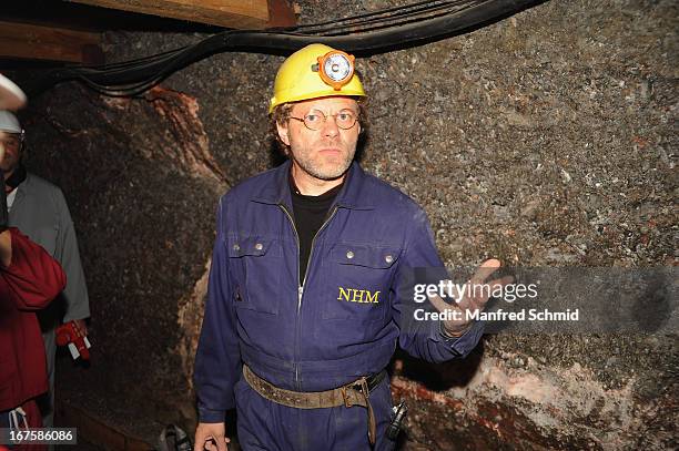 Hans Reschreiter speaks to the audience during a visit to the oldest known wooden staircase which leads to a salt mine on April 26, 2013 in...
