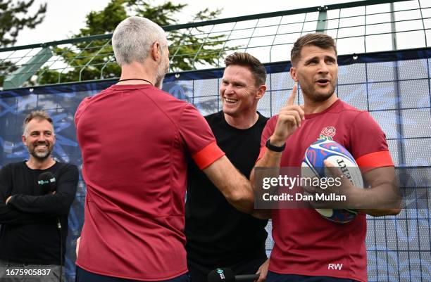Former England player Chris Ashton greets Aled Walters, Strength and Conditioning Coach of England and Richard Wigglesworth, Attack Coach of England...