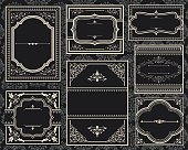 A group of old black ornate vintage frames