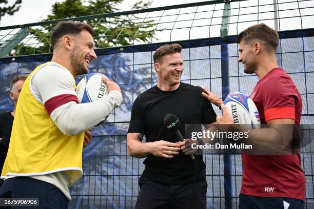 Former England player Chris Ashton greets Danny Care and Richard Wigglesworth, Attack Coach of England during a training session at Stade Ferdinand...