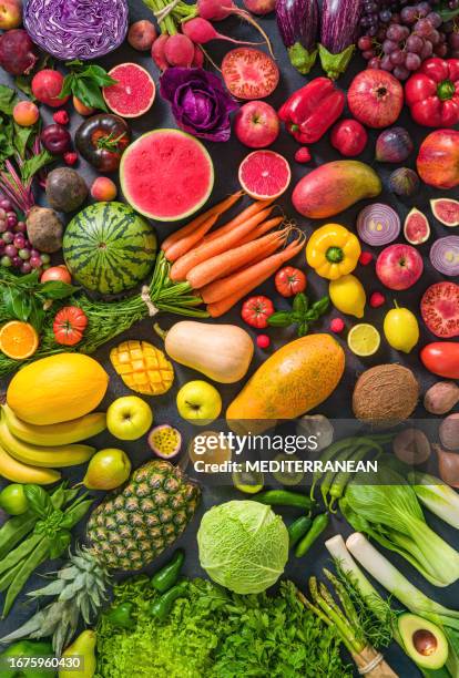 colorful raw fruits and vegetables varied vegan food, vivid rainbow arrangement - full frame vegatable stock pictures, royalty-free photos & images