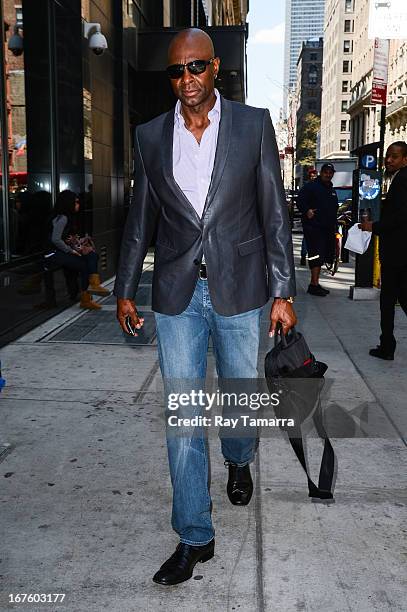 Former American football player Jerry Rice leaves his Midtown Manhattan hotel on April 26, 2013 in New York City.