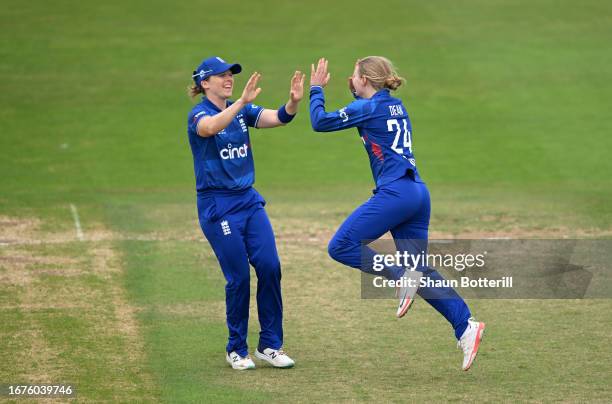 Charlie Dean of England Women celebrates with teammate Heather Knight taking the wicket of Chamari Athapaththu of Sri Lanka Women during the 2nd...