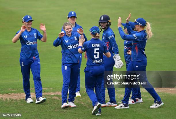 Charlie Dean of England Women is congratulated by teammates after taking a wicket during the 2nd Metro Bank ODI between England Women and Sri Lanka...
