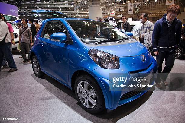 Toyota shows off its new subcompact hybrid model at the Tokyo Motor Show, a biennial auto show held in October or November at the Makuhari Messe...